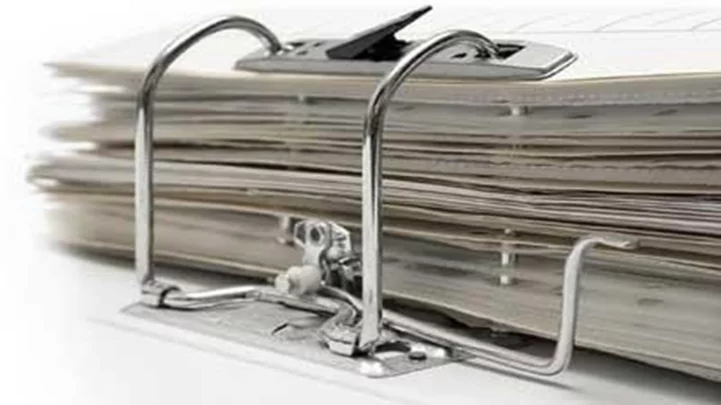 Plastic rings on a conveyor used for automated machine vision inspection.