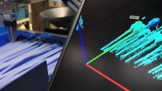 Bin picking application using machine vision to locate and grip medical catheters in random orientations for automated packaging.