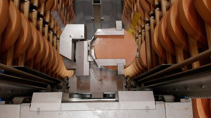 Warehouse where cheese wheels age during the ripening process