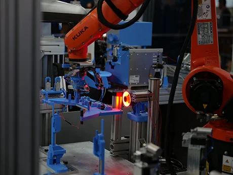 A camera and robotics setup detects the position and orientation of a crimp.