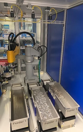 Vision-based assembly system with automatic connecting rod handling and eccentric press integration.