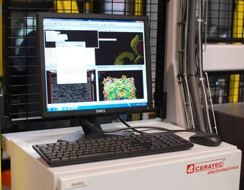 Control unit of a flexible manufacturing cell with 3D vision software for part recognition and robot reachability analysis.