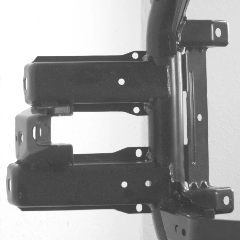 Boreholes in a welded automotive assembly measured using stereo machine vision.