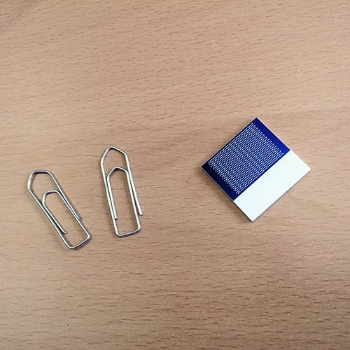 A 2cm×2cm calibration plate from MVTec Software.