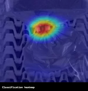 Classification heatmap generated by MERLIC 5 highlighting defect areas on toast packaging using deep learning.