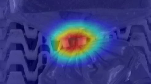 Classification heatmap generated by MERLIC 5 highlighting defect areas on toast packaging using deep learning.