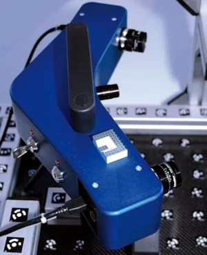 Stereo camera system used for precise 3D calibration and measurement of industrial components.