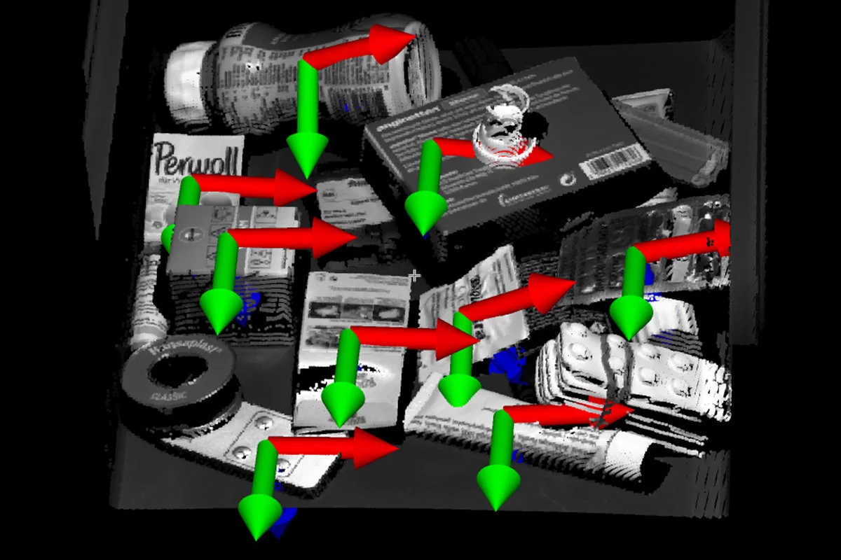 3D Gripping Point Detection: Visualization of automatically detected gripping points on a randomly arranged mixture of various objects in a 3D point cloud.