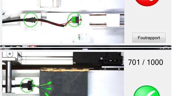 Machine vision inspecting cable tree assembly, showing green and red marks for identifying defects.