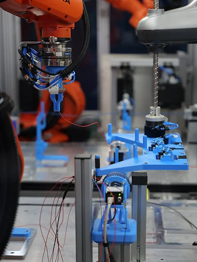 A robot handles different cables.