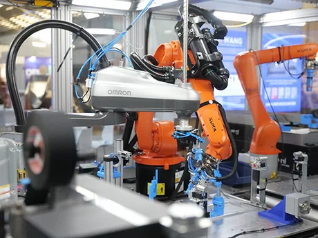 Robotic and camera setup for wire harness manufacturing.