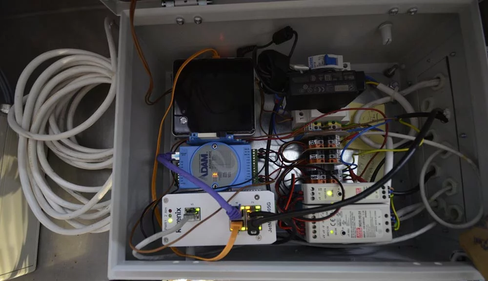 Embedded hardware components used in an industrial machine vision system for food inspection.
