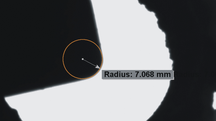 Machine vision measurement of the cutting edge radius and angle of an indexable insert using subpixel accuracy.
