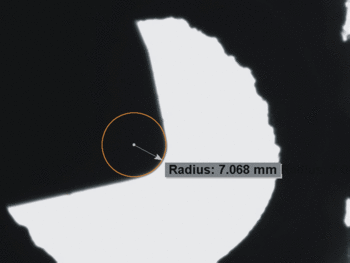 Machine vision measurement of the cutting edge radius and angle of an indexable insert using subpixel accuracy.