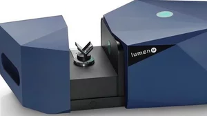 Telecentric optical system measuring precision parts with machine vision.