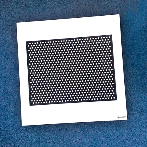 A 32cm×32cm calibration plate from MVTec Software.