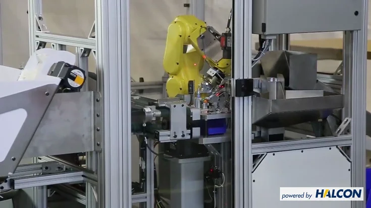 3D vision guided robotic assembly system using HALCON to determine position and orientation of parts from 3D point cloud data for automated clip assembly.