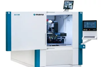 Battery laser welding system used in automated battery production with integrated machine vision inspection.