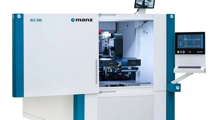 Battery laser welding system used in automated battery production with integrated machine vision inspection.