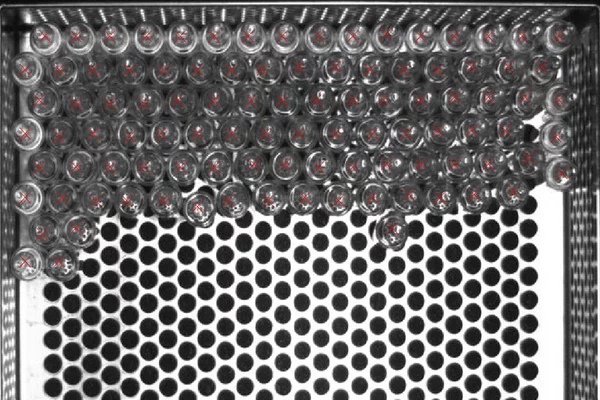 Counting and locating glass bottles in MVTec HALCON.