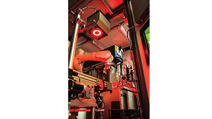 Vision system used for measuring the position and size of laser-drilled holes in plastic parts used in gas safety devices, ensuring accurate hole placement and inspection.