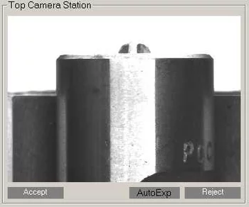 Top camera view used for automated machine vision inspection of cylindrical metal parts.